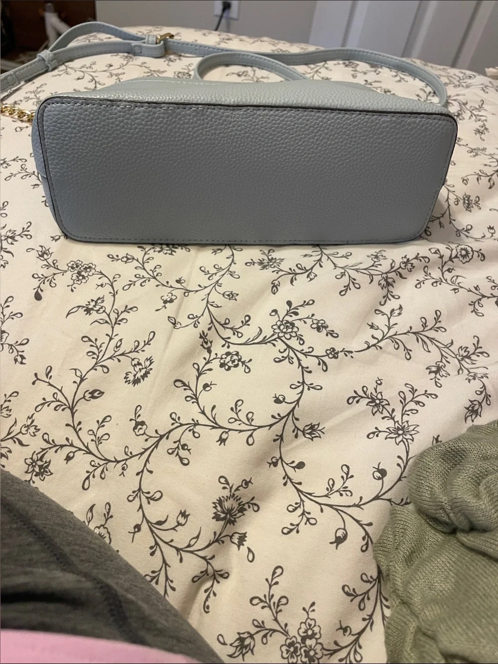 Elegant Light Blue Crossbody Bag with Gold Accents never used